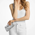 MK Bandolera Hamilton Moderne convertible extrapequeña con piel metalizada