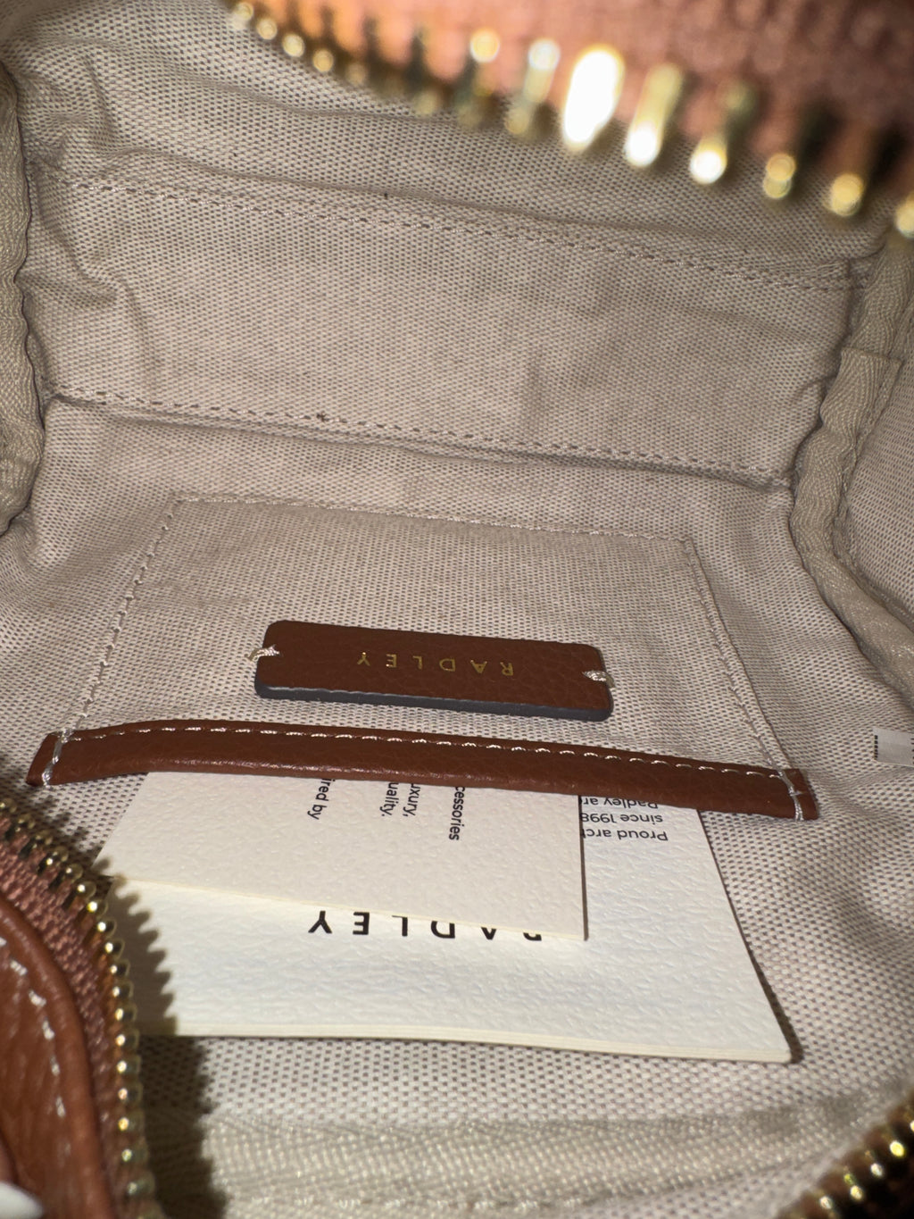 Radley London The Daily
Small Zip Around Cross Body