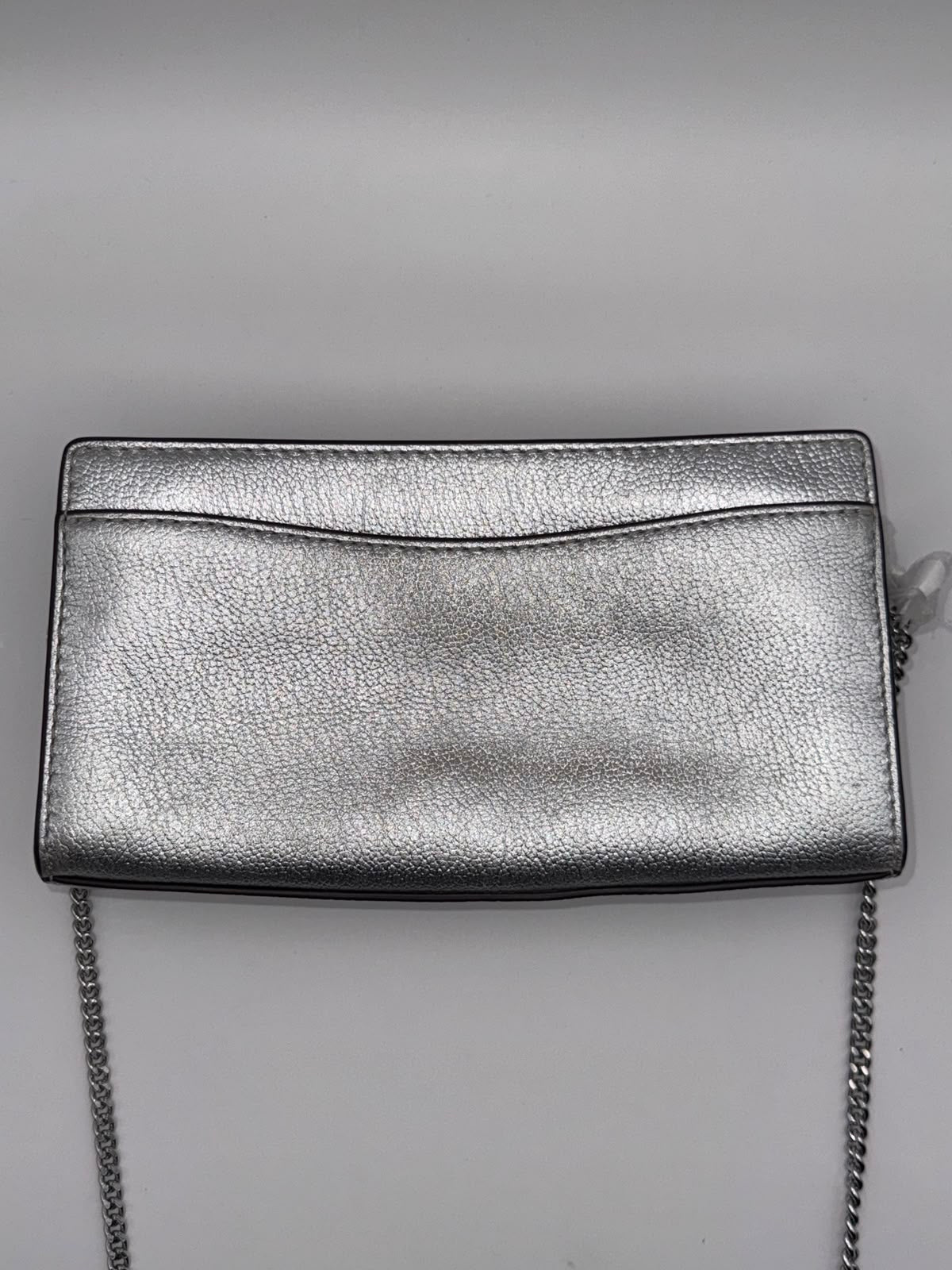 MK Bandolera Hamilton Moderne convertible extrapequeña con piel metalizada